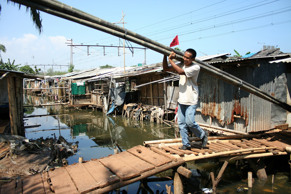 man carrying bamboo, Jakarta