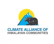 A yak in front of a blue mountain and yellow sun with the climate alliance of Himalayan communities
