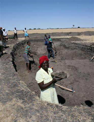 Digging a fish pond, Ondangwa, Namibia