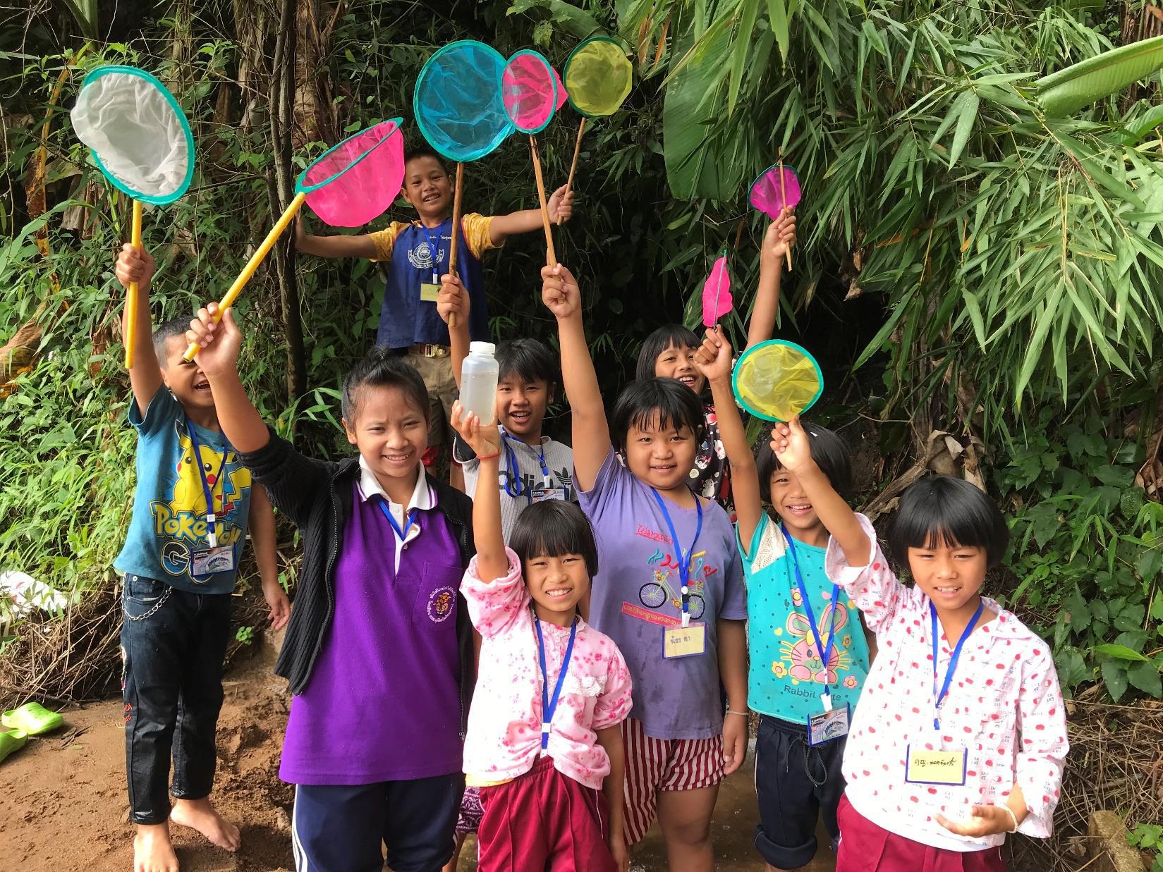 Girls and boys take part in a climate change adaptation project activity in Thailand