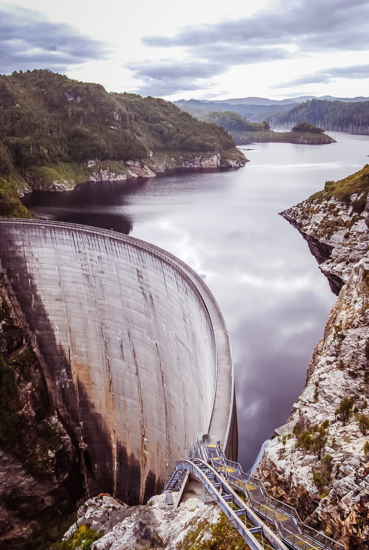 a large dam holding back a reservoir