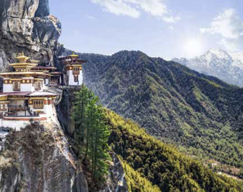 A temple and green mountains in Bhutan