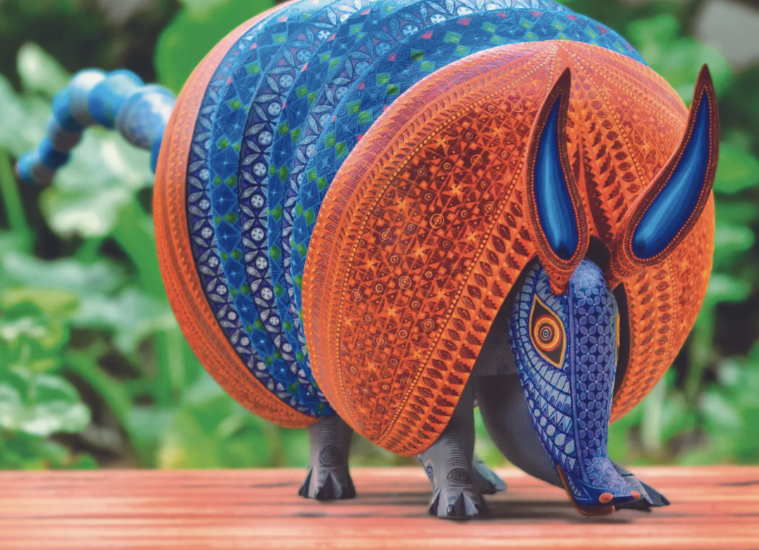 an armadillo in blue and orange